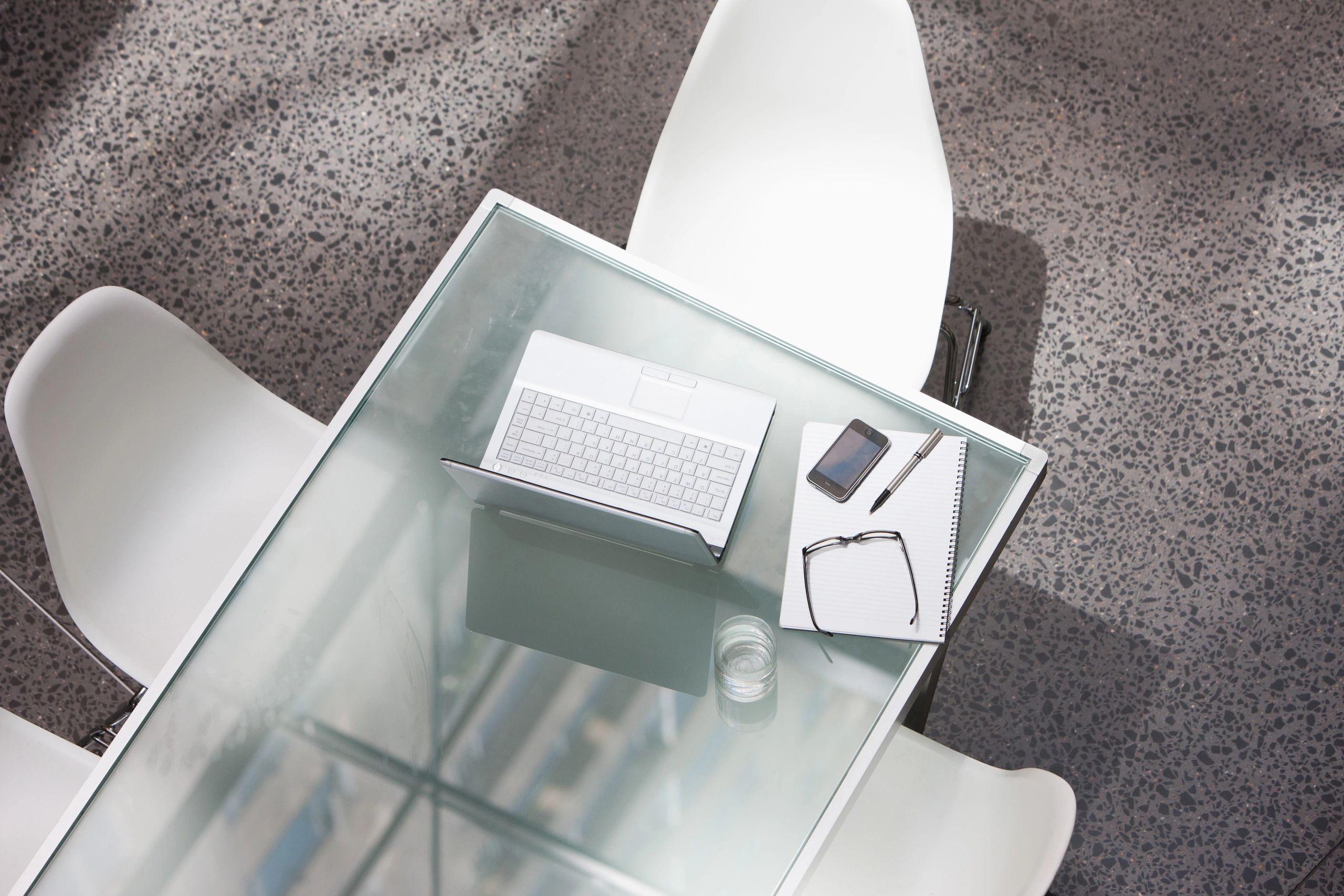 Laptop on a conference table representing professional IT support